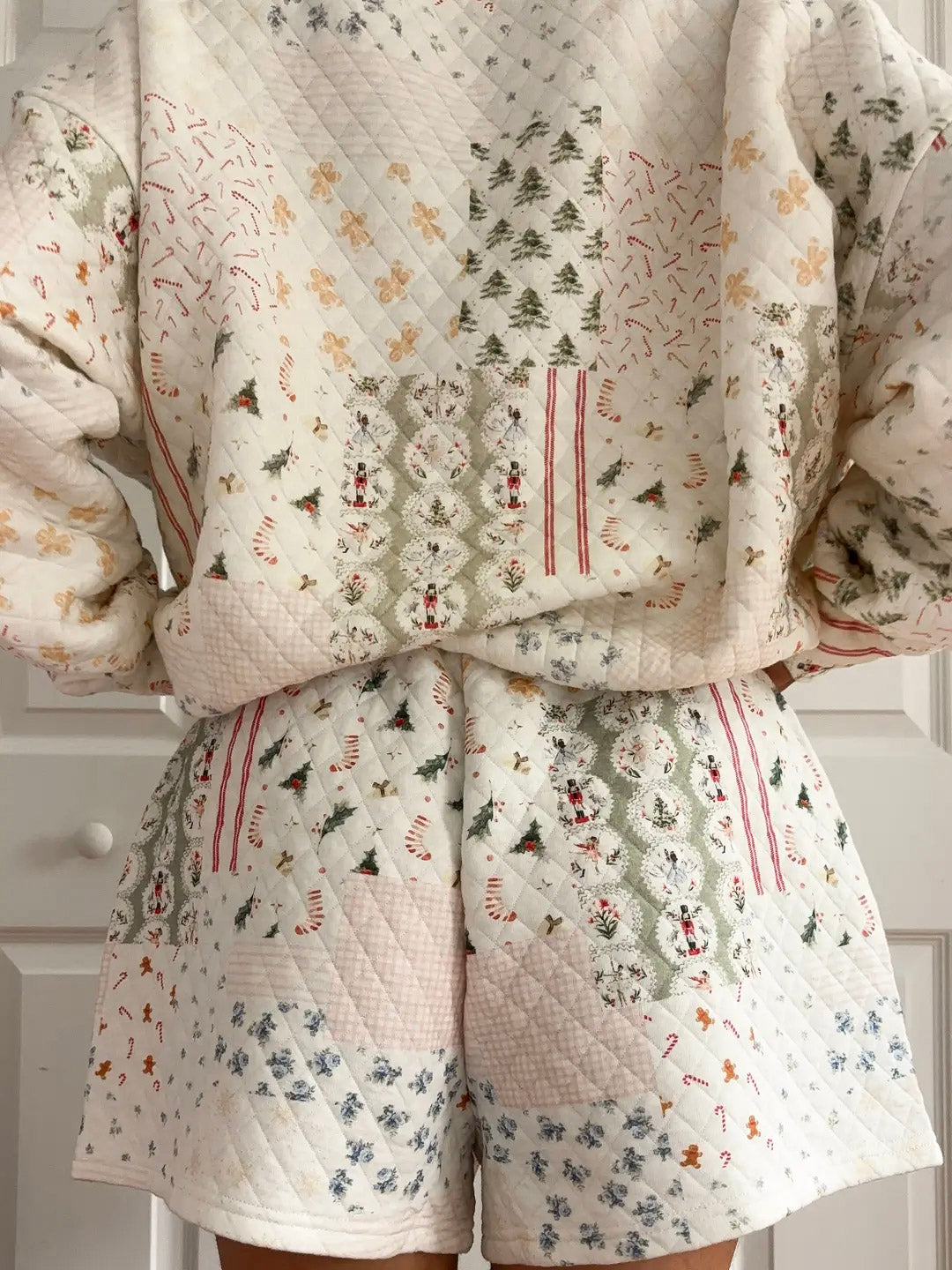 Quilt with various patterns draped over a surface