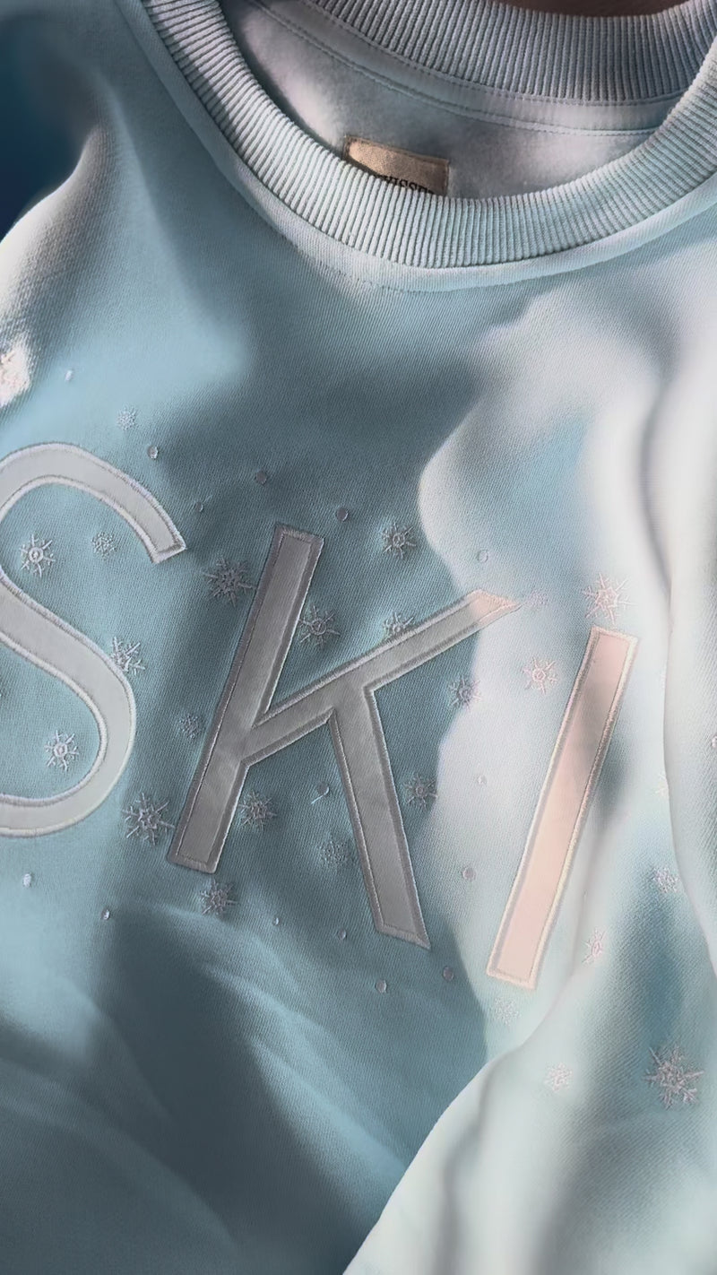Icy Blue Ski Snowflake Sweatshirt