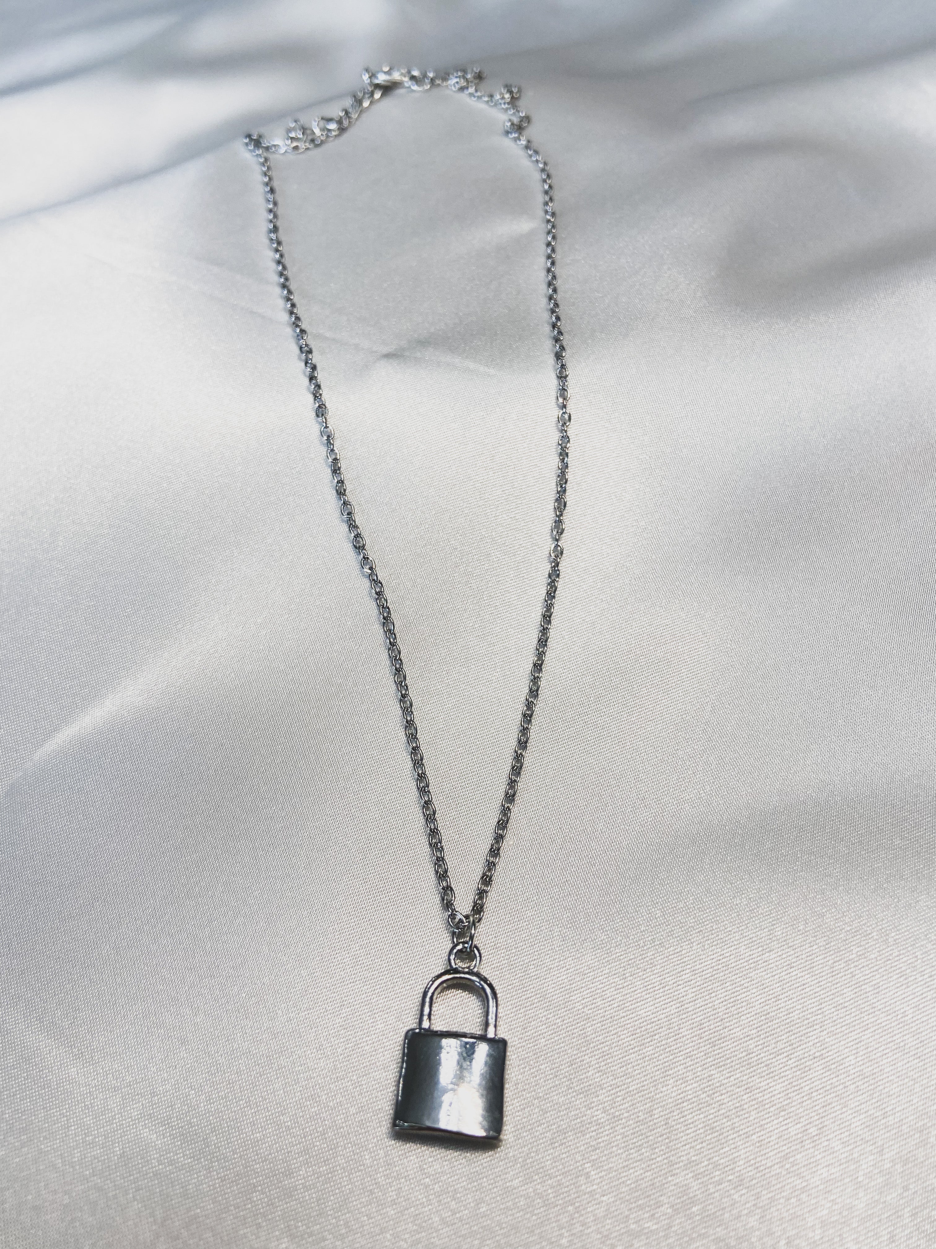 Lock chain necklace on sale men